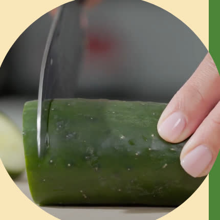 Slicing fresh cucumber